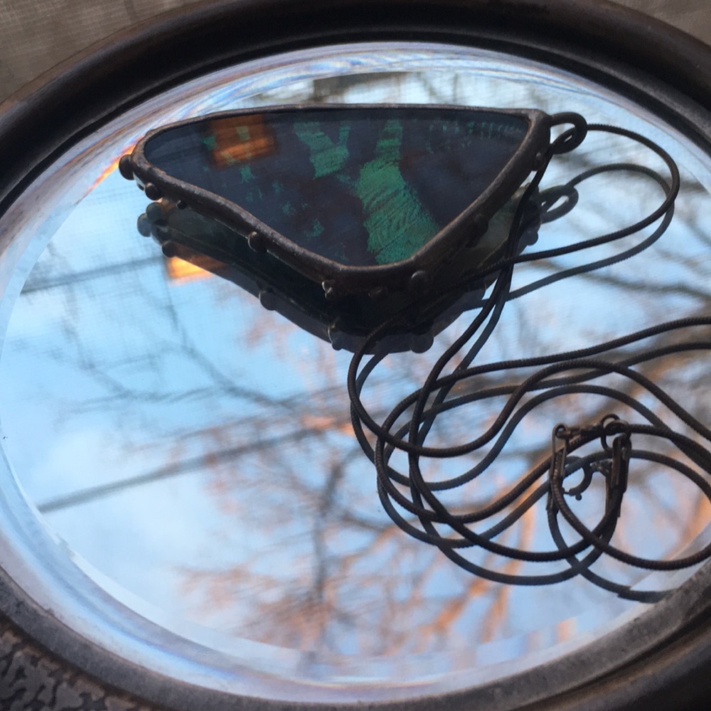 A Real Madagascan Sunset Moth wing necklace